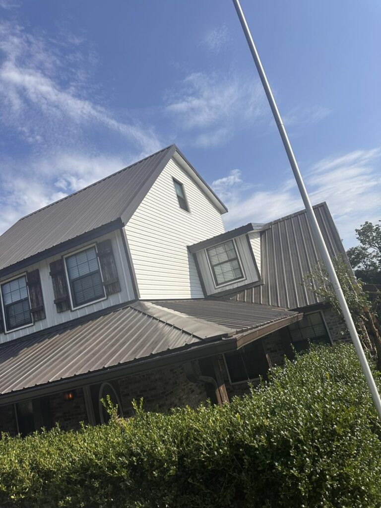Residential roof replacement project on two story home by J Cole Roofing & Construction in Central Arkansas