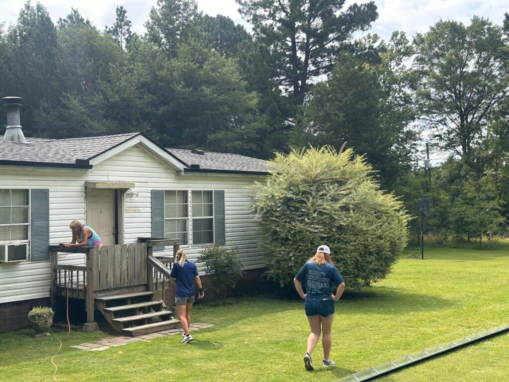 Residential roofing consultation at home by J Cole Roofing & Construction in Austin AR