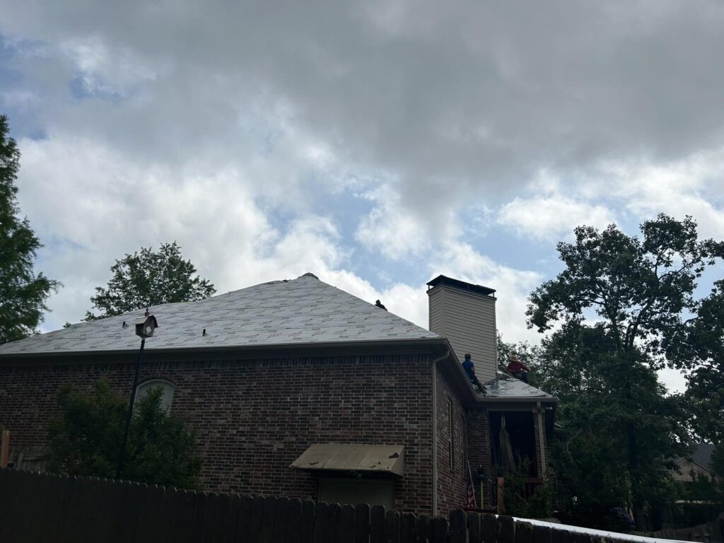 Residential roof replacement project after storm damage by J Cole Roofing & Construction in Central Arkansas