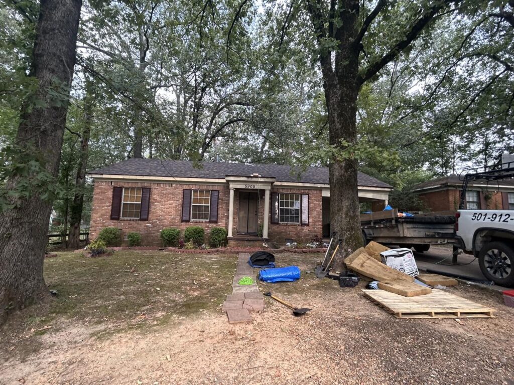 Residential roof replacement project in progress by J Cole Roofing & Construction in Austin AR